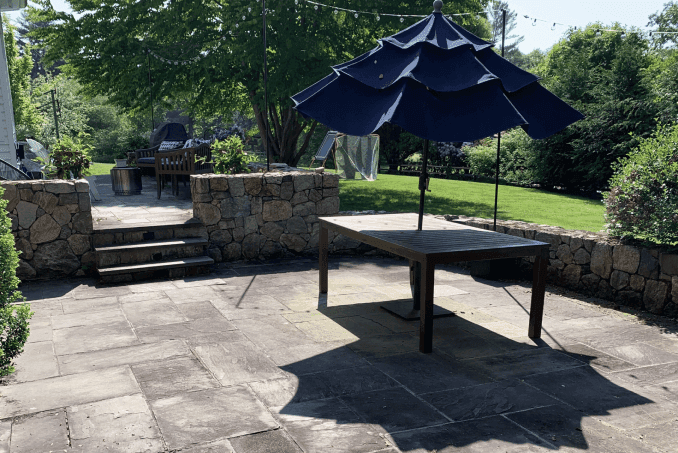 Bluestone patio before power washing in Westport, CT